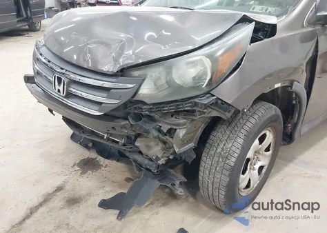 2014 Honda Cr-V Lx z USA, uszkodzony, nr VIN 2HKRM4H38EH681472